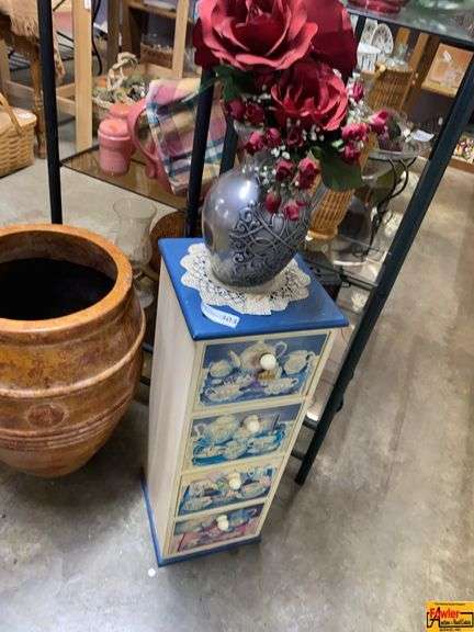Small Decorative Storage Cabinet with Tea Set Motif image