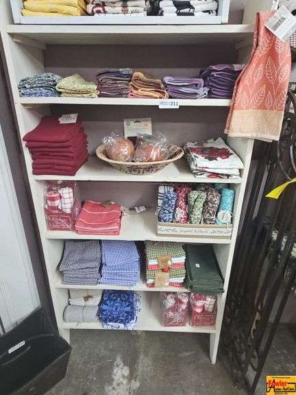 Shelf with Assorted Kitchen Towels, Dish Cloths, and Linens image