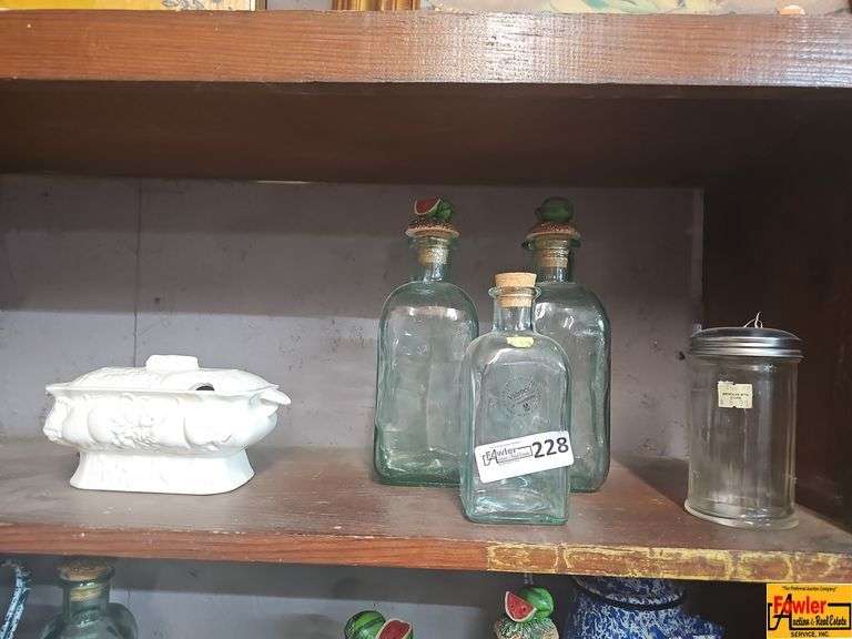 Assorted Glassware Collection: Bottles and Ceramic Covered Dish image