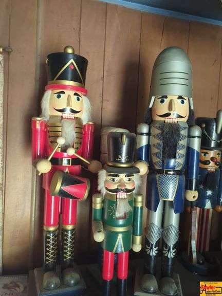 Collection of Wooden Nutcrackers & Figurines (on top of display cabinet) image