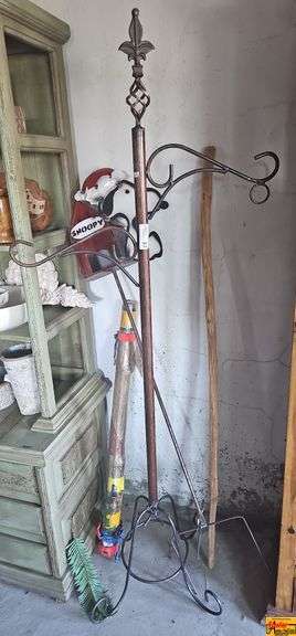 Metal Coat Rack with Snoopy Decoration and Rustic Garden Tools image