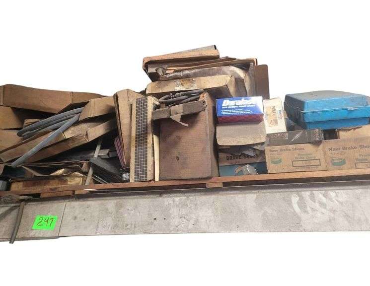 Automotive Hardware - Including Brake Shoes - Radiator Hoses  - On High Shelf - Will Need To Use Ladder to Remove image