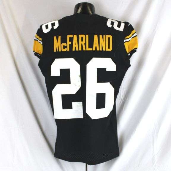 Pittsburgh Steelers #26 Anthony McFarland Game Used Throwback Jersey. Nike Throwback unlaundered jersey worn by running back Anthony McFarland for the November 12, 2023 game against the Green Bay Packers at Acrisure Stadium. Jersey has a 2018 year tag. Jersey has multiple stains, snags, loose threads and other signs of wear. McFarland played just one offensive snap, but did have three kick returns for 73 yards in the game. Each autographed and game-used item is personally authenticated by Pittsburgh Steelers Authentic Memorabilia. Each memorabilia item is affixed with an individually numbered, tamper-evident hologram or vinyl patch which can be verified online ensuring that this item is authentic and eliminating the possibility of fraud. image