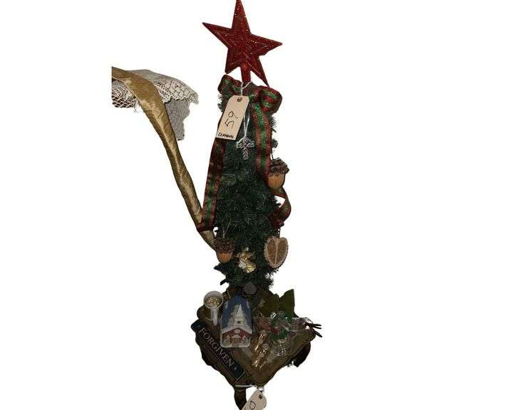 Contents On Top Of Corner Tables Includes- Christmas Tree 44” H. - Crystal Cross- Coffee Cup - Church Lamp - Bronze Baby Shoes