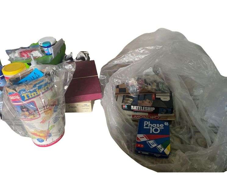 Can of Tinker Toys, Battleship, Monopoly, Checker Board, Uno, Scrabble. And Bible Triva image