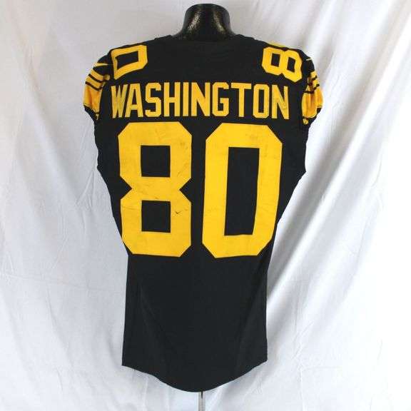 Pittsburgh Steelers #80 Darnell Washington Game Used Color Rush Jersey. Nike Color Rush jersey worn by tight end Darnell Washington for the October 28, 2024 game against the New York Giants at Acrisure Stadium. Jersey has a 2024 year tag. Jersey has several stains, hit marks, transfer, loose threads and other signs of wear. Washington had a catch for 29 yards in the game. Jersey comes with a Davious Sports photo match. Each autographed and game-used item is personally authenticated by Pittsburgh Steelers Authentic Memorabilia. Each memorabilia item is affixed with an individually numbered, tamper-evident hologram or vinyl patch which can be verified online ensuring that this item is authentic and eliminating the possibility of fraud. image