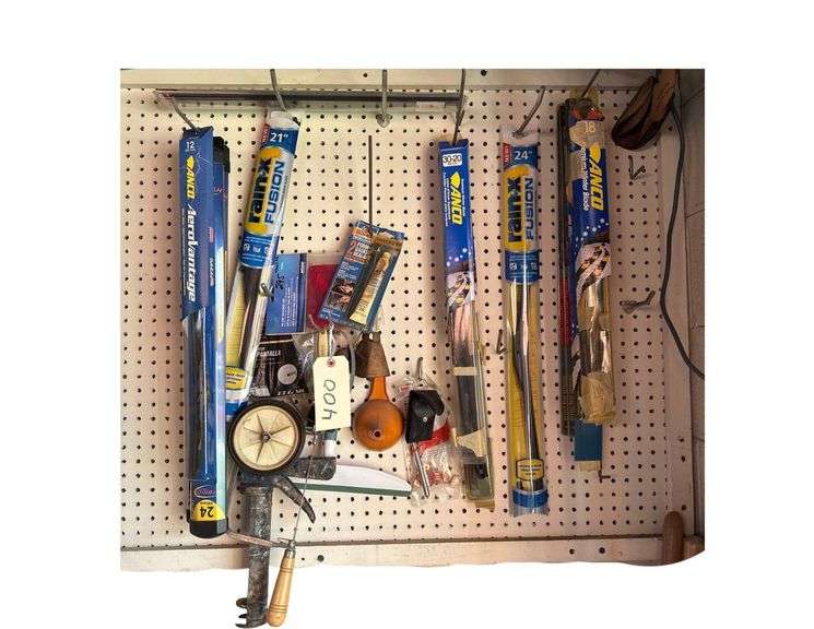 Contents On Pegboard Includes Wiperblades - Coping Saw - Caulking Gun image