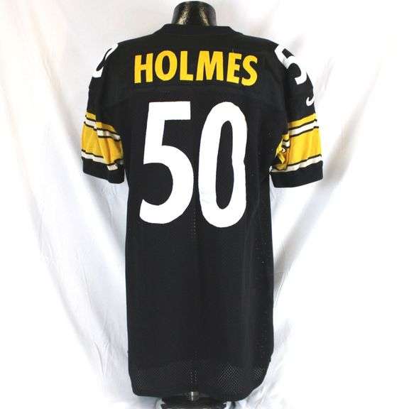 Pittsburgh Steelers #50 Earl Holmes Game Used Home Jersey. Nike jersey used by linebacker Earl Holmes. Jersey has a 1997 year tag. Jersey has several team repairs, loose threads, stains, scrapes and other signs of wear. Holmes was a Steeler from 1996 through 2001, playing six of his 10 year career in black and gold. He started every game he played in from 1997-2001. Each autographed and game-used item is personally authenticated by Pittsburgh Steelers Authentic Memorabilia. Each memorabilia item is affixed with an individually numbered, tamper-evident hologram or vinyl patch which can be verified online ensuring that this item is authentic and eliminating the possibility of fraud. image