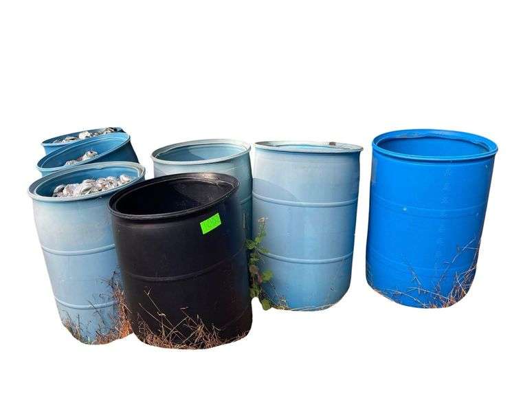 7 Plastic 55 Gallon Blue Barrels 3.5 are Full of Aluminum Cans image