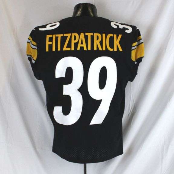 Pittsburgh Steelers #39 Minkah Fitzpatrick Game Used Home Jersey. Nike home jersey worn by safety Minkah Fitzpatrick. Year of use is undetermined. Jersey has a 2018 year tag and features the COVID tracker pouch. Jersey has stains, loose threads, snags and other signs of wear. Each autographed and game-used item is personally authenticated by Pittsburgh Steelers Authentic Memorabilia. Each memorabilia item is affixed with an individually numbered, tamper-evident hologram or vinyl patch which can be verified online ensuring that this item is authentic and eliminating the possibility of fraud. image