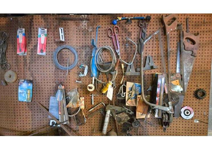 Contents Hanging on Back Wall, Saws, Scissors, and Caulking Guns image