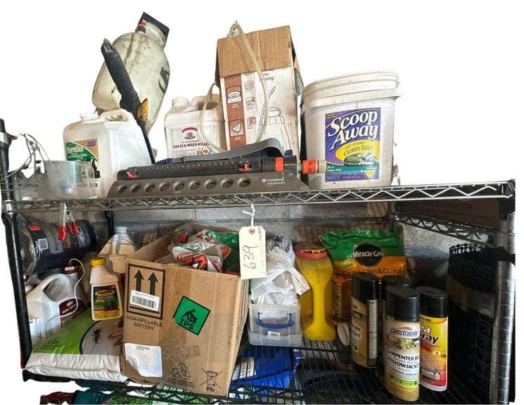 Contents of Top Two Shelves  - Lawn and Garden Product - Lawn Sprinklers  - Sprayers -  Bug Spray - Weed/Grass Product - Etc. image