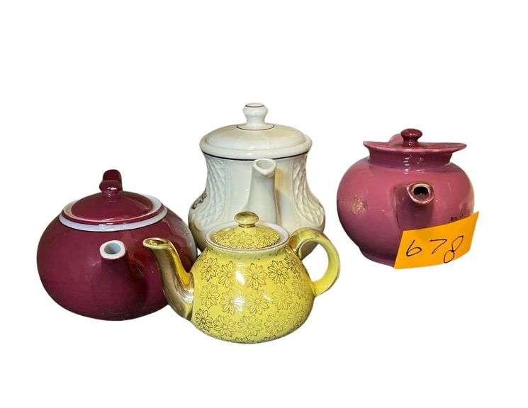 A Collection of 4 Tea Pots From 4 up to 7 Inches Tall image