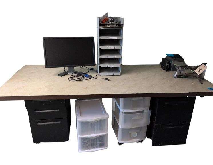 Table, Filing Cabinets, Paper Trays, Computer Monitor. image