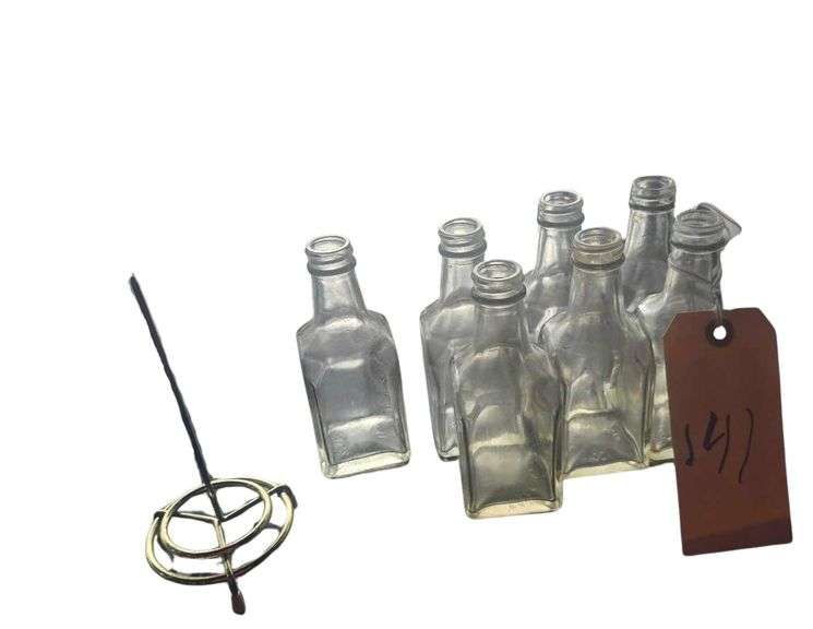 Vintage Glass Bottles And Check Spindle image
