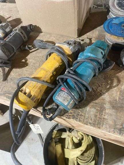 A Makita and a DeWalt Electric Angle Grinders Makita 4" Mod .N9514B, Dewalt DW402 image