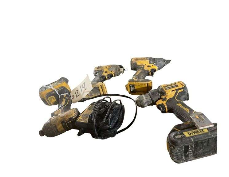 4 DeWalt Tools 2 Brushless Drills and 2 Impact Drills 2 Batteries and a Charger image