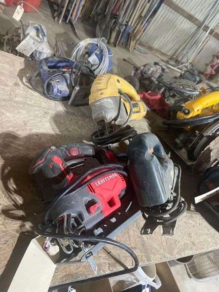 A Set of 4 Electrical Jig Saws. A Craftsman Type 1 CME612, Black &Decker JS250, DeWalt DW317, Humpbell Hausfeld 3.1 image