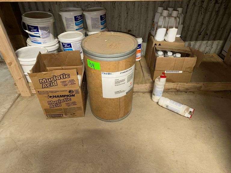 Contents Of Bottom Shelf Includes Assorted Pool Chemicals & Acids image