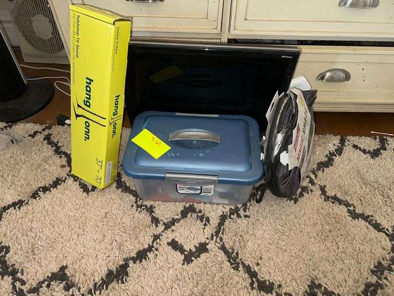 Plastic Tote Of Hair Products Hang On Tabletop TV Stand Magic Shade Gateway Computer Monitor