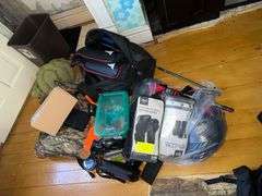 Contents On Floor Includes Bb Gun Items Boxing Gloves Turtle Pillow Duffle Bag