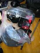 Contents On Floor Includes Bb Gun Items Boxing Gloves Turtle Pillow Duffle Bag