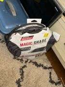 Plastic Tote Of Hair Products Hang On Tabletop TV Stand Magic Shade Gateway Computer Monitor