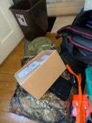 Contents On Floor Includes Bb Gun Items Boxing Gloves Turtle Pillow Duffle Bag