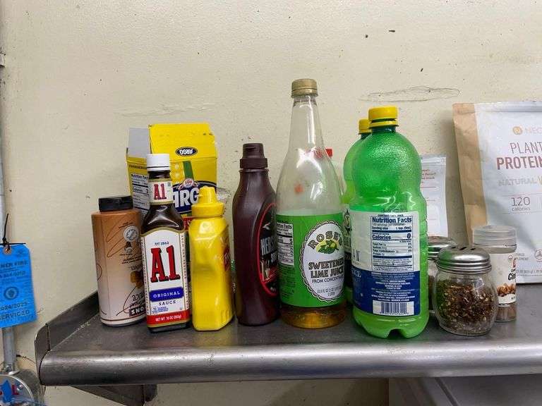 2 Stainless Steel Shelfs 36x11x10 Inches with Contents on Top Shelf