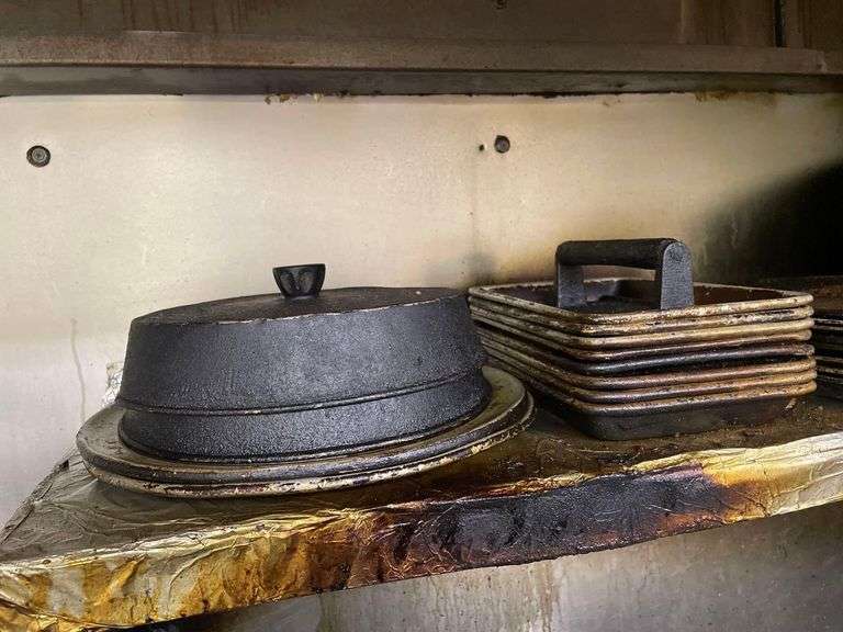 A Collection of Well Seasoned Cooking Pans