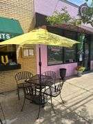 2 Ft. Square Steel Table With 4 Chairs & Umbrella