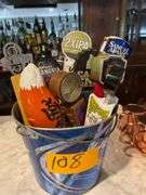 Approximately 8 Beer Taps in a Budweiser Bucket