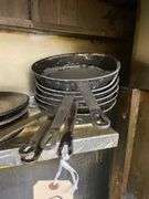 A Collection of Well Seasoned Cooking Pans