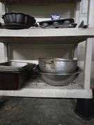 Plastic Shelf and Contents Including Large Metal Bowls, Large Colander, Fry Pans, Muffin Tins, Plastic Food Buckets. Shelf 63 in. T x 36 in. W x 17 in. D