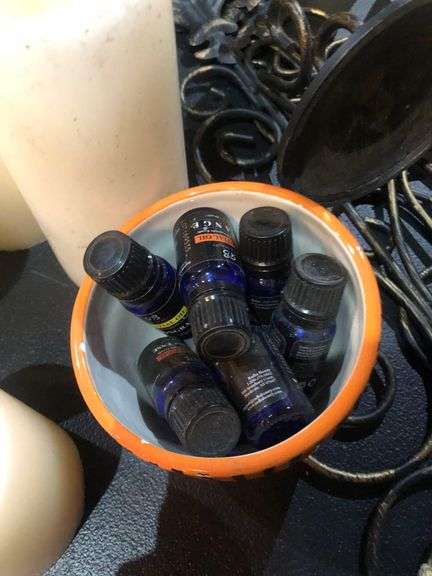 Many Various Sized Fake Candles, Wall Decorations, Essential Oils, Scent Blower, and Various Candle Holders