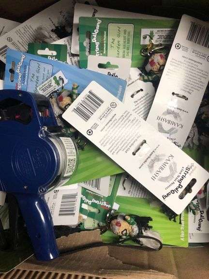 String Doll Keychains, Price Tagger, Box of Hand Sanitizer, Scare House Pins and Drawstring Bags, Office Storage Items