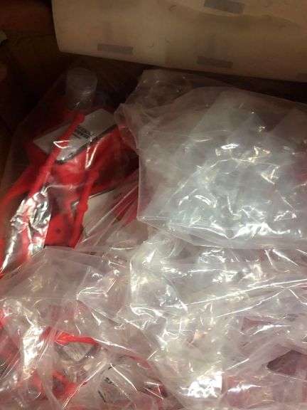 String Doll Keychains, Price Tagger, Box of Hand Sanitizer, Scare House Pins and Drawstring Bags, Office Storage Items