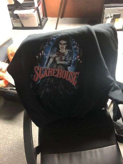 3 Storage Bins of Scare House Hoodies, 1 Bin of Merch Displays