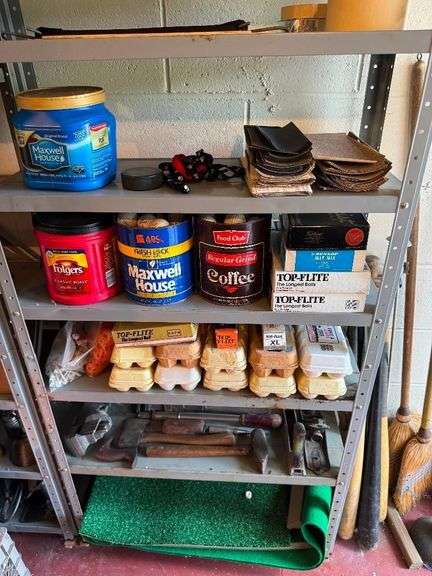 2 Metal Shelves and Contents which include Golfing Mats, Golf Balls and etc.