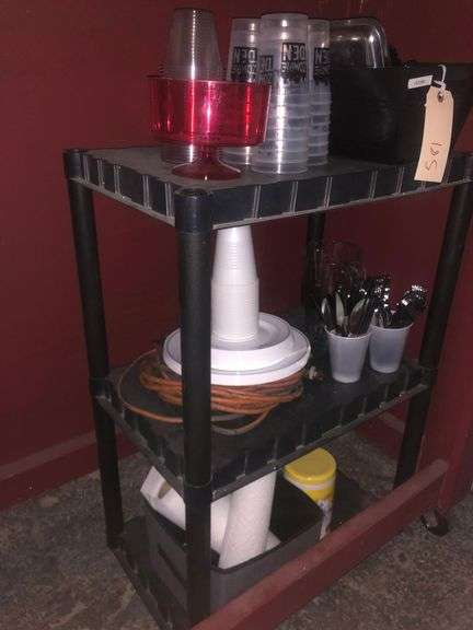 Black Plastic Cart Without Wheels, Plastic Cups, Plates, and Utensils, Various Kitchen Utensils, Extention Cord, Paper Towels