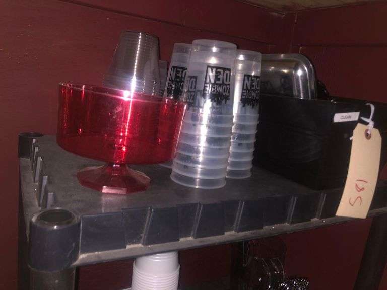 Black Plastic Cart Without Wheels, Plastic Cups, Plates, and Utensils, Various Kitchen Utensils, Extention Cord, Paper Towels