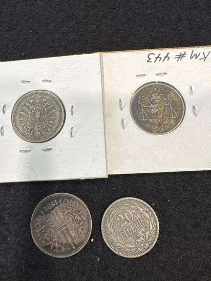 4 Foreign Coins, including: 1874 Germany 10 Pfennig w/ G Mint Mark - 1894 Hungary 20 filler - 1895 Austria 1 Corona - 1950 Mexico 25 Centavos
