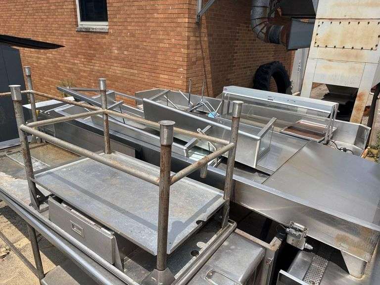 Large Lot of Stainless Steel Tables and Sinks - Including a 9’ Stainless Table, 8’ Table w Drawer, 3 Basin Sink, 12x8 L Shaped Table, 2 Table Top Shelves, 6’ Chest w/ Hand Washing Sink
