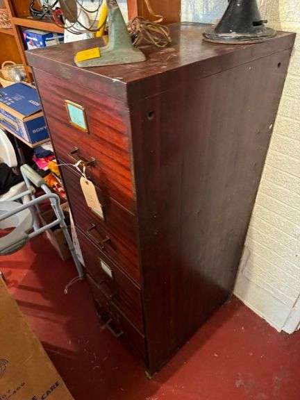 Two 3 Drawer Vertical and One 4 Drawer Vertical File Cabinets