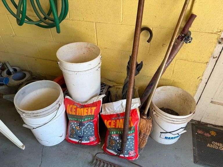 All Items on Right Hand Wall of Garage, Including Hoses, Rakes, Brooms, Shovels, Extension Cord, Creeper, Rope, Buckets, Watering Cans