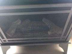 Metal Fireplace, Kenmore Air Conditioner, Various Decor