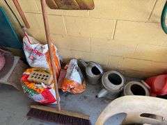 All Items on Right Hand Wall of Garage, Including Hoses, Rakes, Brooms, Shovels, Extension Cord, Creeper, Rope, Buckets, Watering Cans