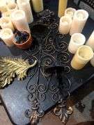 Many Various Sized Fake Candles, Wall Decorations, Essential Oils, Scent Blower, and Various Candle Holders