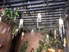 All Wall and Ceiling Decor Including Faux Plants, Vines, and Flowers, and Hanging Lanterns