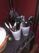 Black Plastic Cart Without Wheels, Plastic Cups, Plates, and Utensils, Various Kitchen Utensils, Extention Cord, Paper Towels